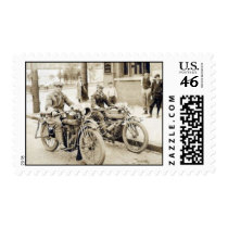 2 men riding motorcycles postage stamps