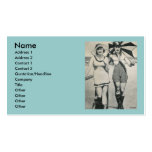 2 women parasols kinky suits business card