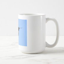 2J2 Hummingbird in Flight in a Blue Sky Mugs