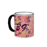 39 & Holding Coffee Mug