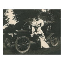 3 ladies posing by old car poster posters