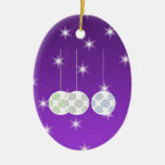 3 White Christmas Baubles on Purple Background. Christmas Tree Ornaments