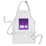 3 White Swirl Design Christmas Baubles. On Purple Aprons
