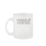 A balanced diet is chocolate in both hands coffee mugs