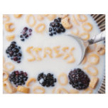 A bowl of alphabet cereal pieces floating in milk flyers