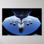 A C-17 Globemaster III receives fuel Poster