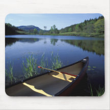 A canoe rests on the shore of Little Long Pond Mousepad