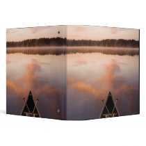 A canoe rests on the shore of Pawtuckaway Lake 3 Ring Binder
