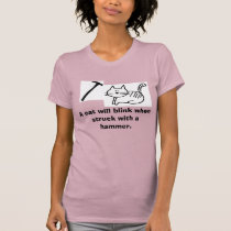 A cat will blink when struck with... t-shirts