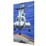 A CH-46E Sea Knight helicopter Canvas Prints