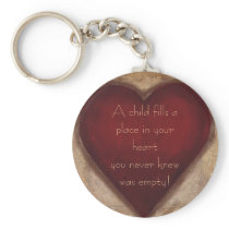 A Child Fills Keychain