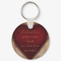 A Child Fills Keychain