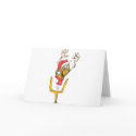 A christmas football wearing a christmas hat cards
