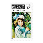 A christmas greeting with a girl carrying christma