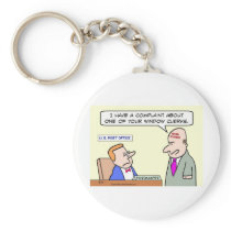 A complaint at the Post Office keychains