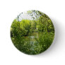 A cottage tucked away pinback button