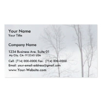A Cow Eating Grass On The Hill With Naked Trees Business Card