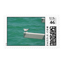 A Cut Fishing Bird On The Side Of Strut Above Wate Stamp