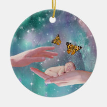 A cute baby boy in hand fantasy christmas tree ornaments
