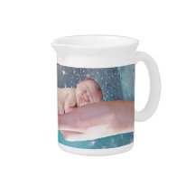 A cute baby in hand fantasy beverage pitchers