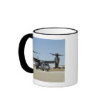 A CV-22 Osprey prepares for take-off Coffee Mug