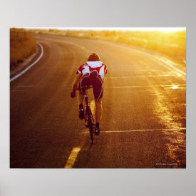 A cyclist on road bike near Great Salt Lake Poster