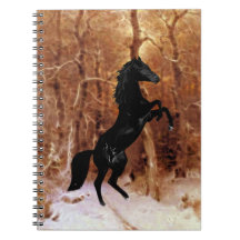 A friesian in winter snow spiral note book