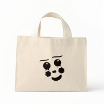 A fun whimsical clown face design graphic tote bags