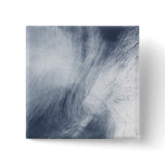 A giant whirlpool cloud swirls above the sea pinback button