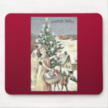 A girl standing with basket of gifts near christma mousepad