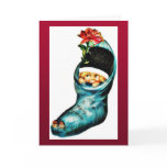 A girl with santa claus hat sitting in christmas s