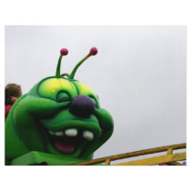 A green caterpillar goofy fair ride image flyer design