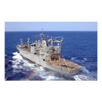 A helicopter clears the flight deck