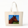 A horse standing proud tote bags