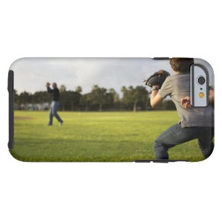 A kid wearing a baseball glove waits for his dad tough iPhone 6 case