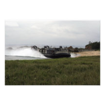 A landing craft air cushion comes ashore photo