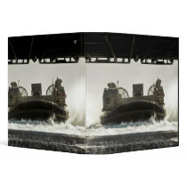 A landing craft air cushion prepares to enter 3 ring binder