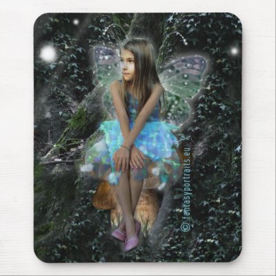 A light blue fairy on a mousepad by myfairies