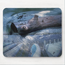 A log and board's, on a mousepad mousepads