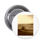 A lonely farm pinback button