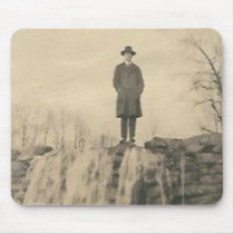 A man on a cliff mousepads