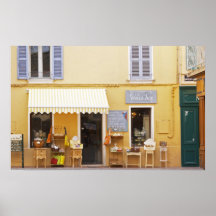 A market street in the old town with a shop print