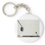 A meter makes a move on a stop light. key chain