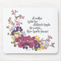A Mother holds a child's heart Mouse Pads