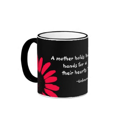 "A mother holds her..." Coffee Mug by BrattiGrl