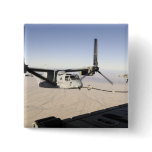 A MV-22 Osprey refuels midflight Buttons