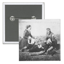 A Nurse Tending a Wounded Man Button