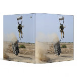 A pararescueman drops into the zone binders