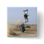 A pararescueman drops into the zone button