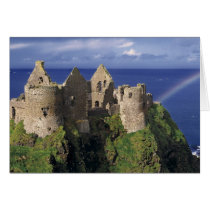 A rainbow strikes medieval Dunluce Castle on Cards